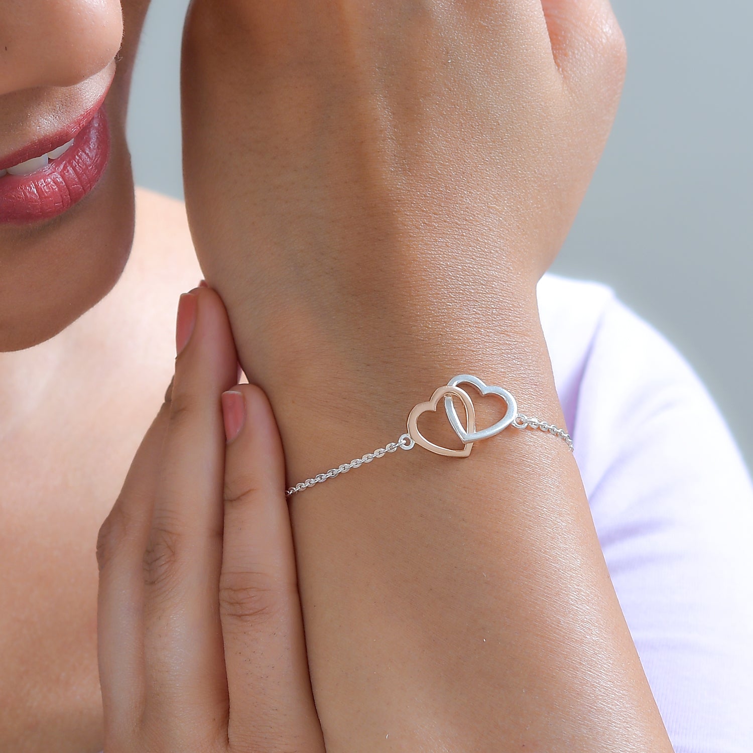 Interlocking heart bracelet hot sale