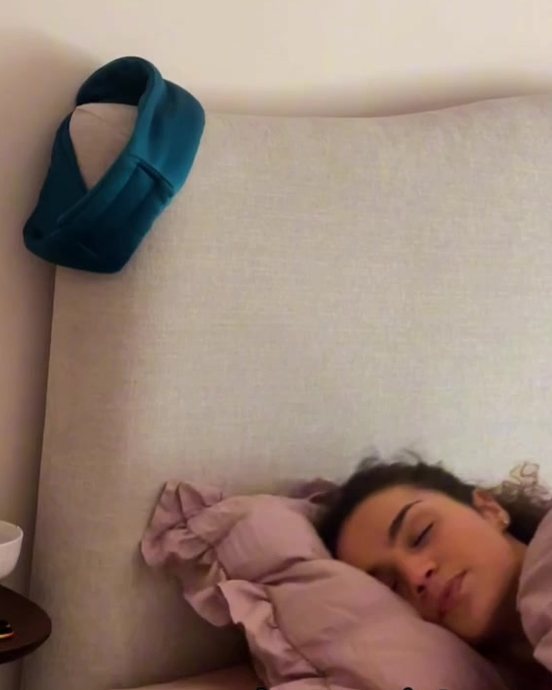 Asleep in bed wearing sleep studs