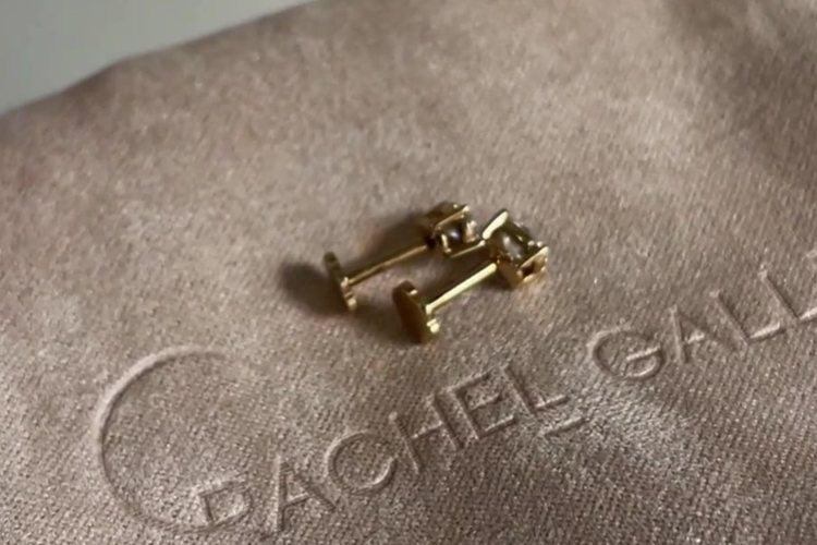 Pair of Oracle sleep studs showing their flat backs