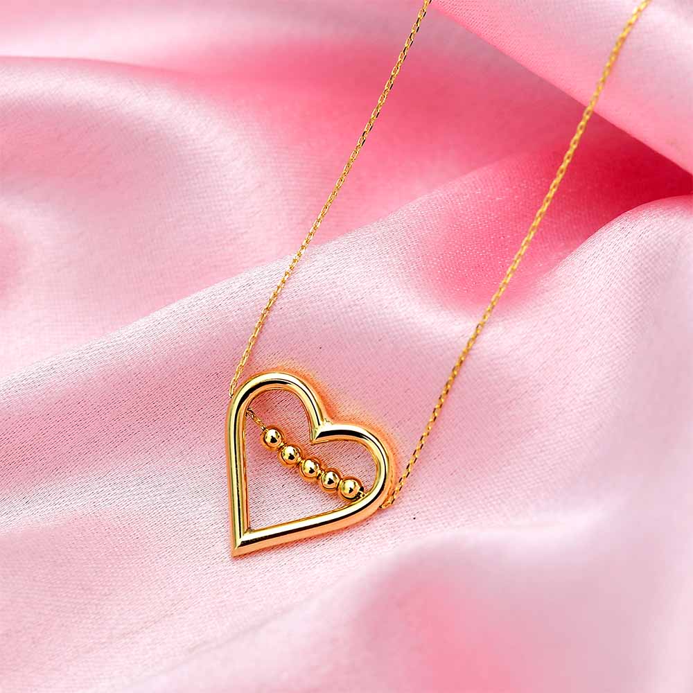 Gold Essentials Pierced Heart Necklace,7824137