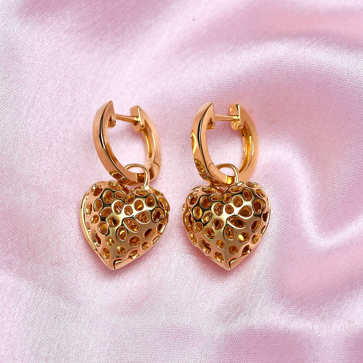 Angel deals heart earrings